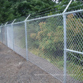 10 or 11 Gauge Galvanized Iron Chain Link Fence with Security Top Barbed Wire.